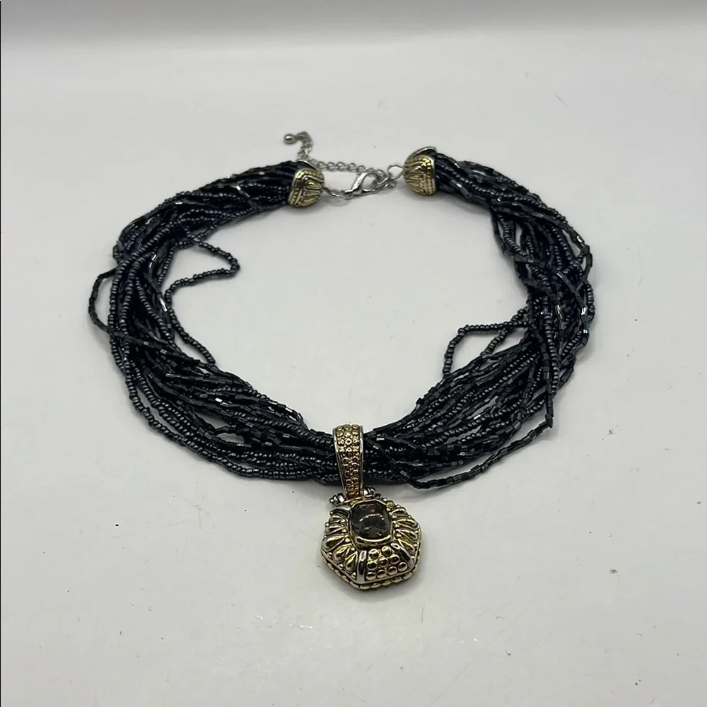 Elegant Black Beaded Necklace with Gold and Silver tone Pendant with Quartz
